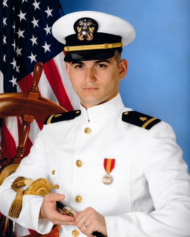 J. Alexander Batista in United States Navy service dress white uniform